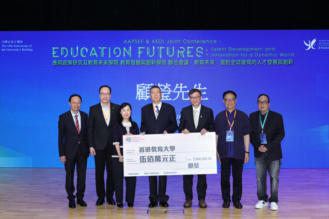 A cheque donation takes place to express gratitude to Mr Gu Ying for his generous contribution